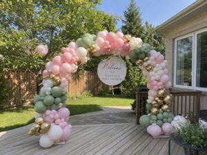 Luxury balloon arch for baby shower in Barrie with blush pink, sage green, and gold balloons by Petal Pop